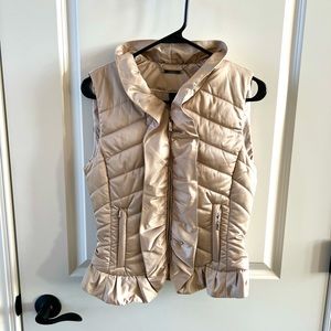 WHBM gold vest with ruffles on the front & around the bottom